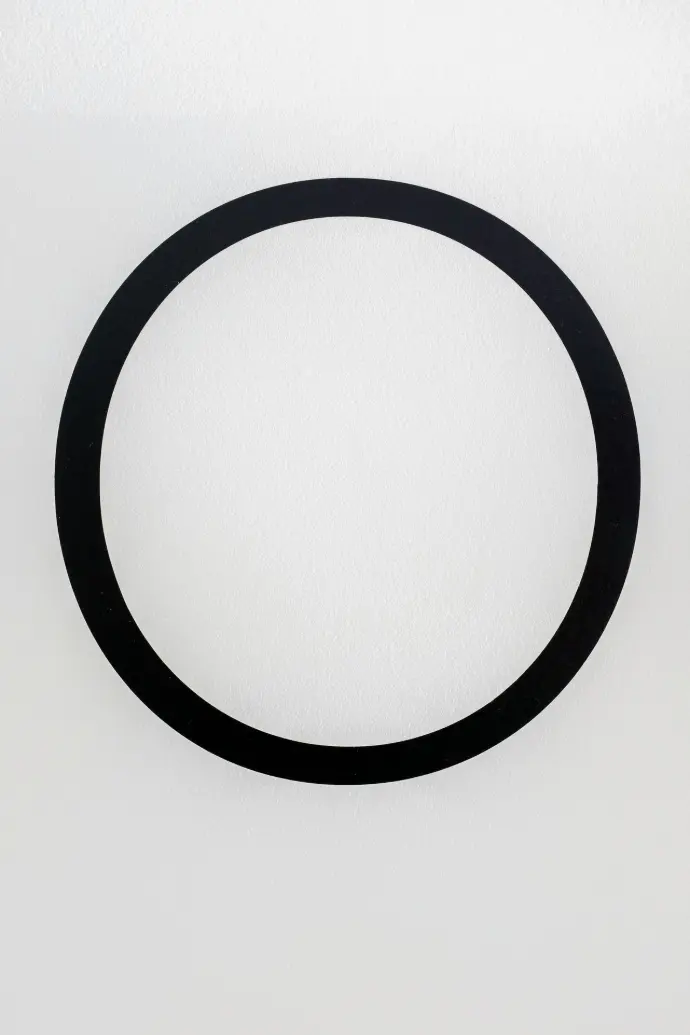 black round frame on white surface